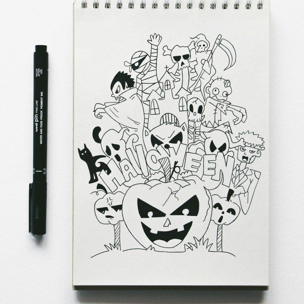 Carnet de gribouillis et feutre noir